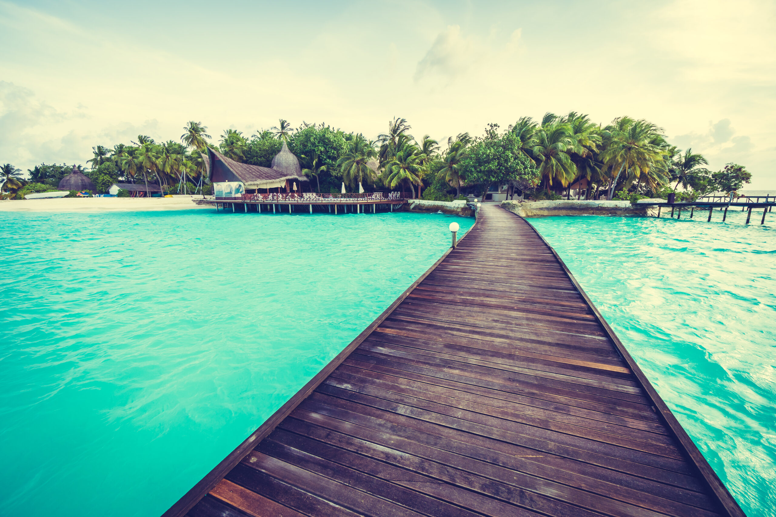 Beautiful tropical Maldives resort hotel and island with beach and sea on sky for holiday vacation background concept -Boost up color Processing