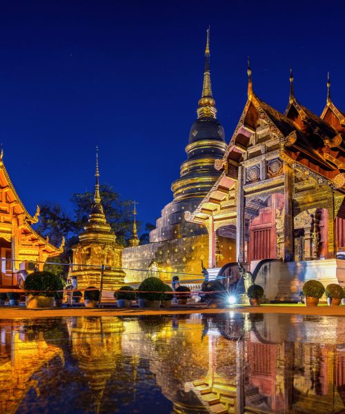 Wat Phra Singh temple at night in Chiang Mai, Thailand.